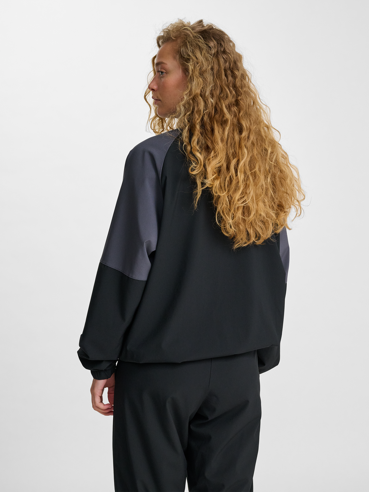 hmlLOOSE TRACK ZIPJACKET SPORTSWEAR