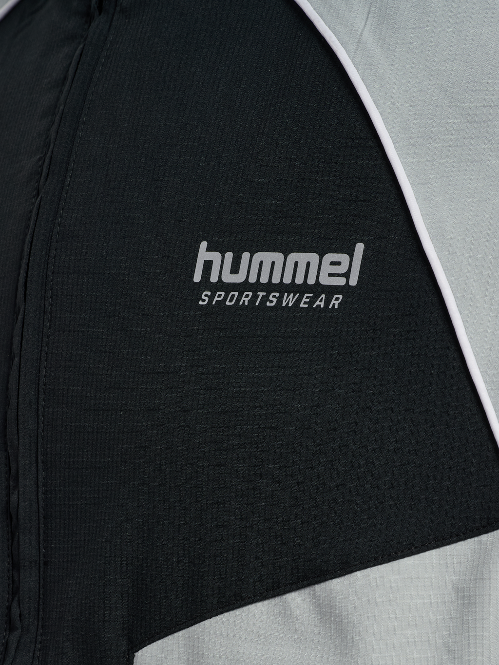 hmlLOOSE TRACK ZIPJACKET SPORTSWEAR